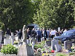 Traveller funeral is broken up by police after mourners seize the body back from morgue