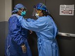 Photos capture a nurse being given a pep talk after a corona patient suffers a heart attack