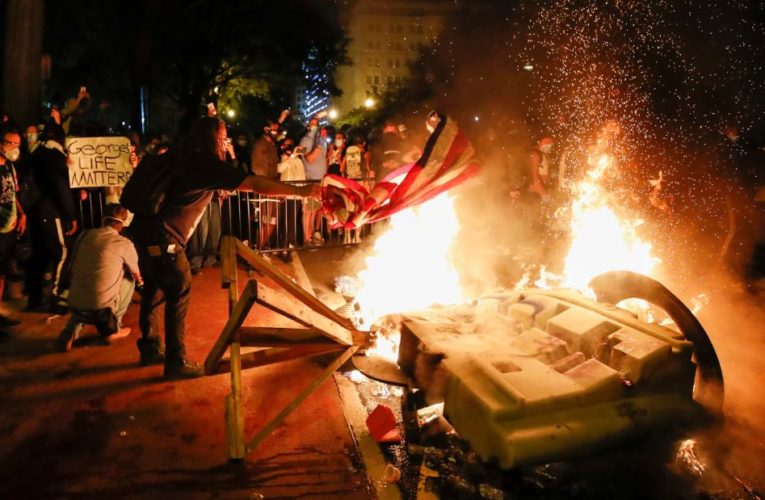 Protestors face off with the forces of order in DC and New York, as crowds gather at City Hall in San Francisco