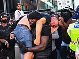 Black Lives Matter supporter carries ‘far-Right’ protester at London Waterloo station