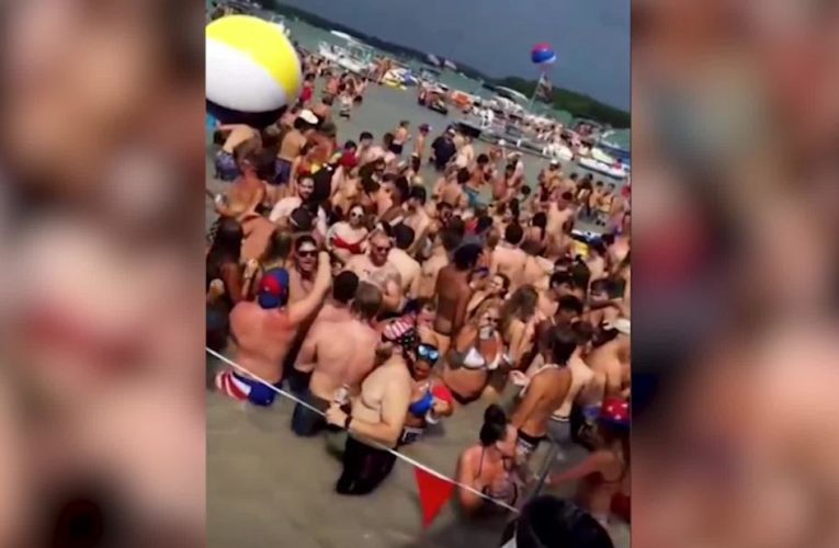 Video shows packed Michigan lake party despite warnings