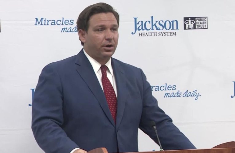 Heckler shames Florida governor during press conference