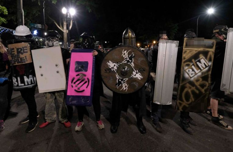 Several protesters arrested in Portland after police say they blocked buildings and threw projectiles