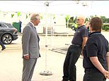 Moment man FAINTS while chatting to a shocked Prince Charles