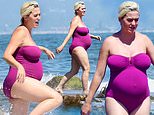 Pregnant Katy Perry wears fuchsia swimsuit on Malibu beach