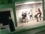 Brawl on the empty streets of Magaluf’s party strip as thugs throw a metal bin across the street