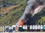 Terrifying moment sunseekers flee Bournemouth seafront inferno after ‘beach hut BBQ’