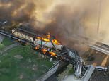 Arizona freight train derails causing fire and bridge collapse