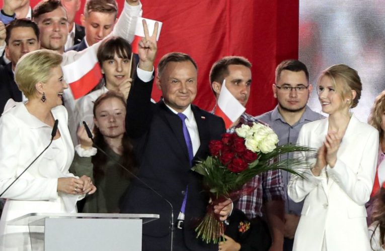 Conservative Polish president wins 2nd term after tight race