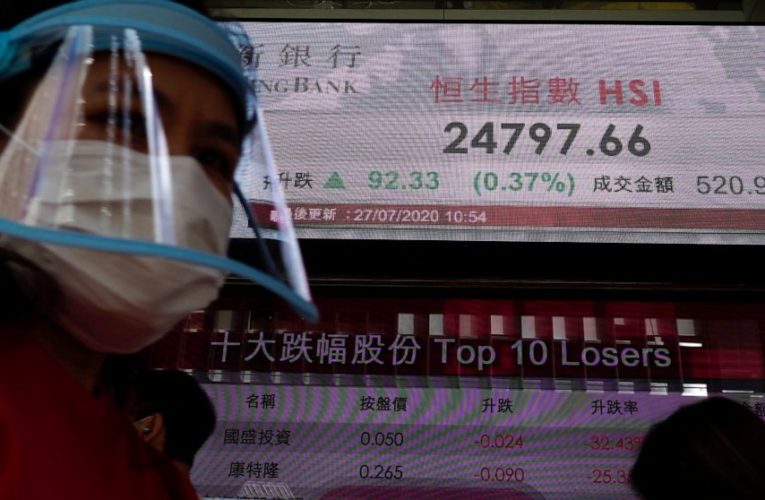 Stocks resume rise, gold rushes to record ahead of busy week