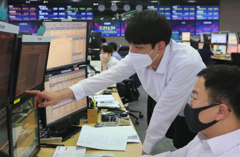 Shares mixed in Asia as China-US tensions cast shadow