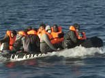 GMB reporter Jonathan Swain pursues ten migrants as they cross Channel