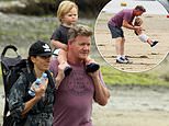 Gordon Ramsay enjoys a day on the beach with wife Tana and son, Oscar, one