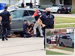 Video shows Jacob Blake brawling with cops before being shot as Wisconsin cops are placed on leave