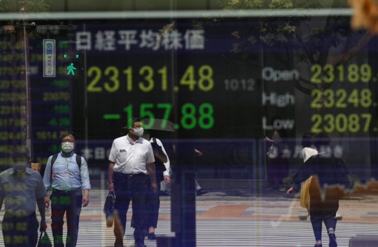 Asia shares mixed after tech rally takes S&P 500 near record