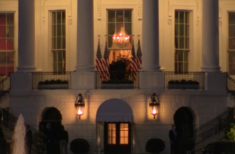 Watch: Infected Trump re-shoots entrance into White House