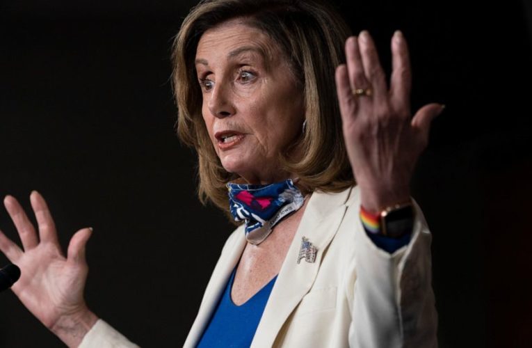 House Democrats pass partisan COVID bill; relief talks drag