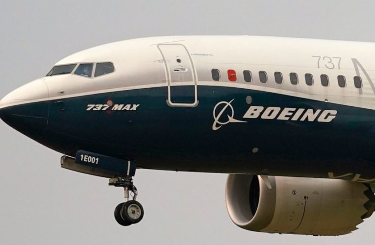 Boeing says pandemic will cut demand for planes for a decade