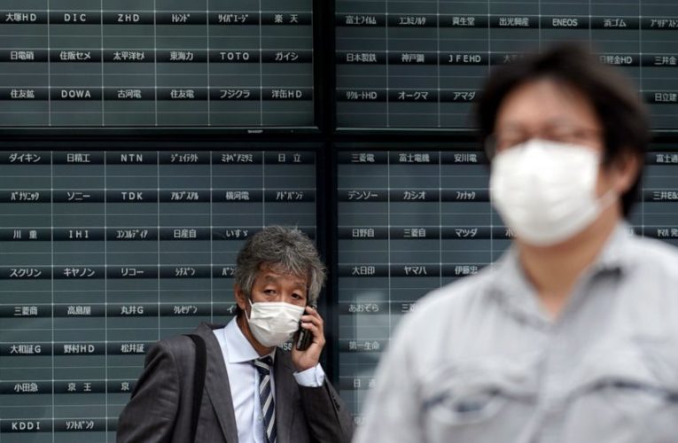 World shares mostly higher; Tokyo trading halted by outage