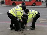 Coronavirus UK: Anti-lockdown protestor bursts into tears as police arrest him