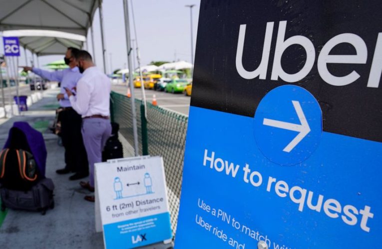 Uber, Lyft spend big, win in California vote about drivers