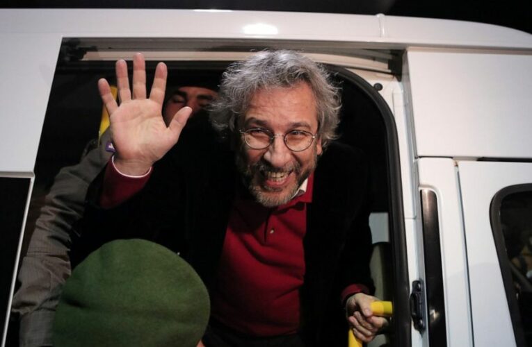 Turkish court convicts journalist Dundar on terror charges