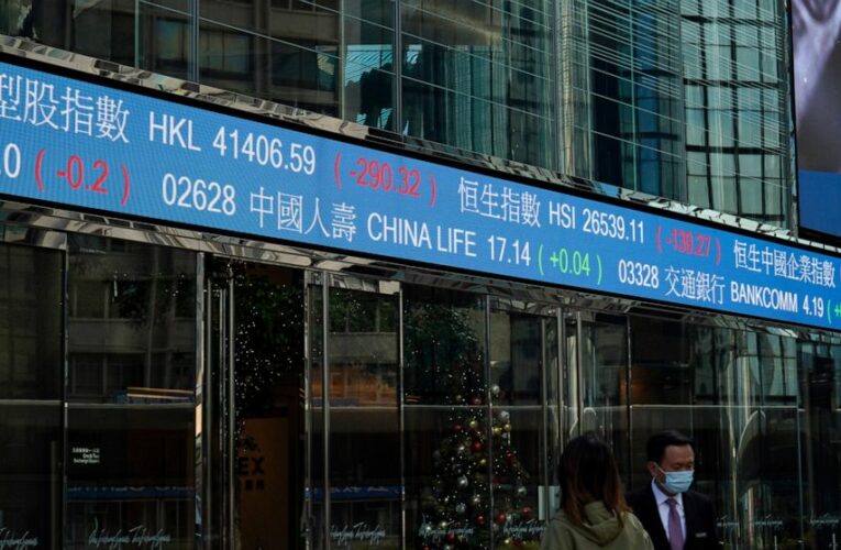 Asian stocks mixed after Wall St record on stimulus hope
