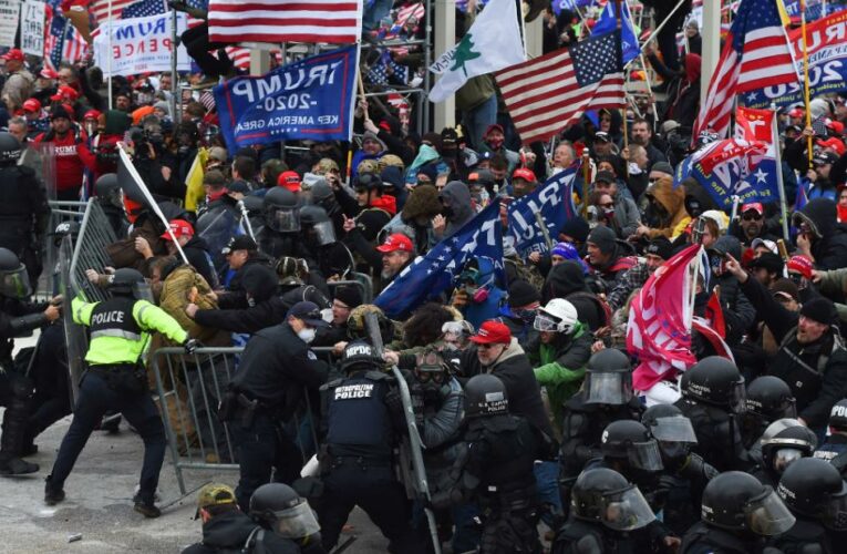 As the inauguration nears, one expert warns the nation is heading ‘into a buzzsaw’ due to divisiveness, extremist actions and political rhetoric