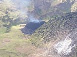 Residents of St Vincent and the Grenadines told to evacuate as volcanoes begin spewing ash