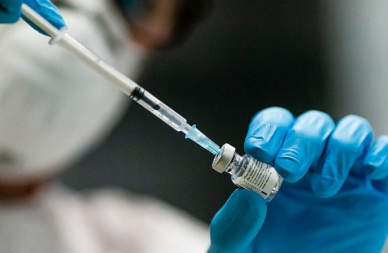 The Latest: Germany defends vaccine campaign, procurement