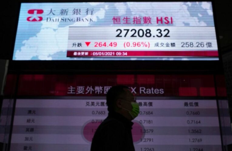 Stocks turn lower as virus cases rise, countries lock down