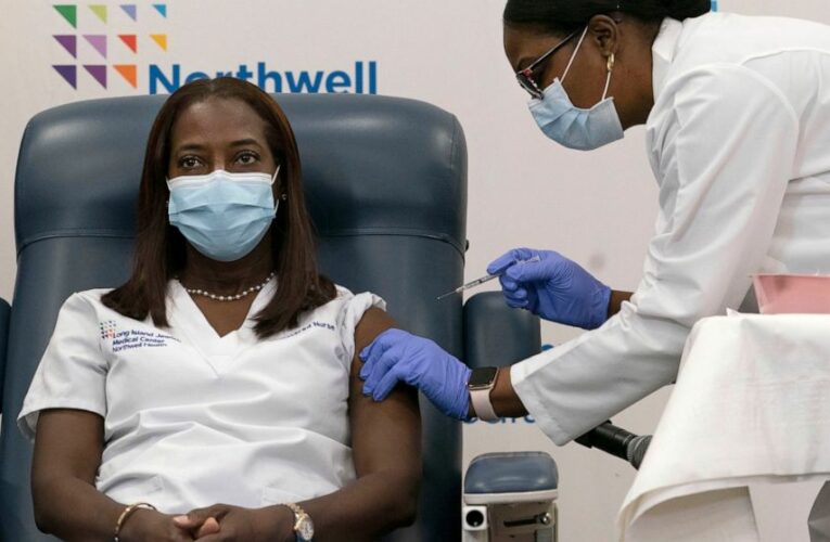 Biden signs burst of virus orders, requires masks for travel