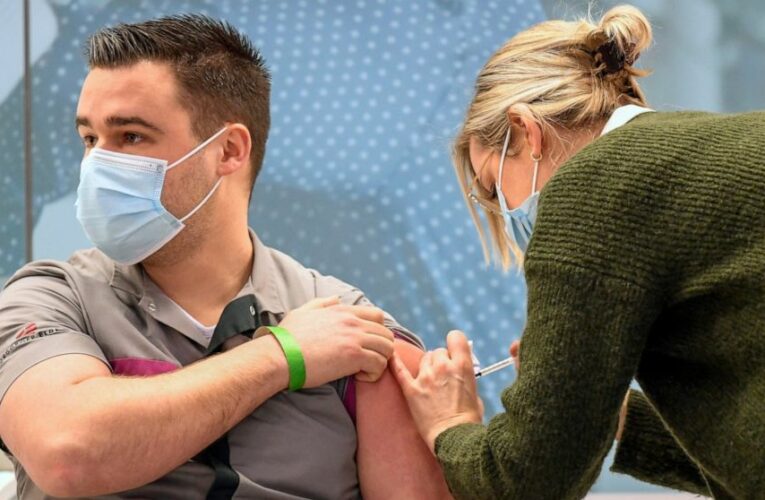 The Latest: Dutch kick off vaccinations, last in EU to do so