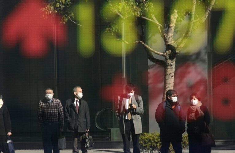 Japan shares fall on pandemic worries as rest of Asia rises