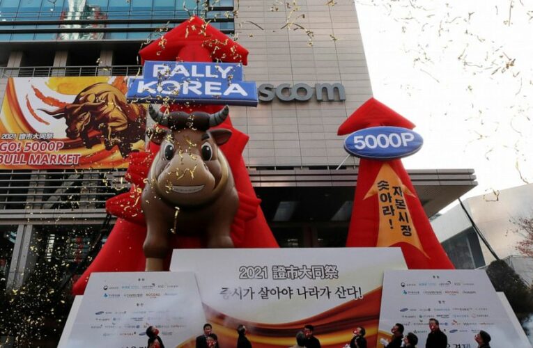 Global stocks rise after Wall Street ends 2020 at new highs