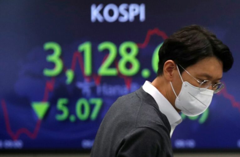 Asian shares mostly lower after mixed day on Wall Street