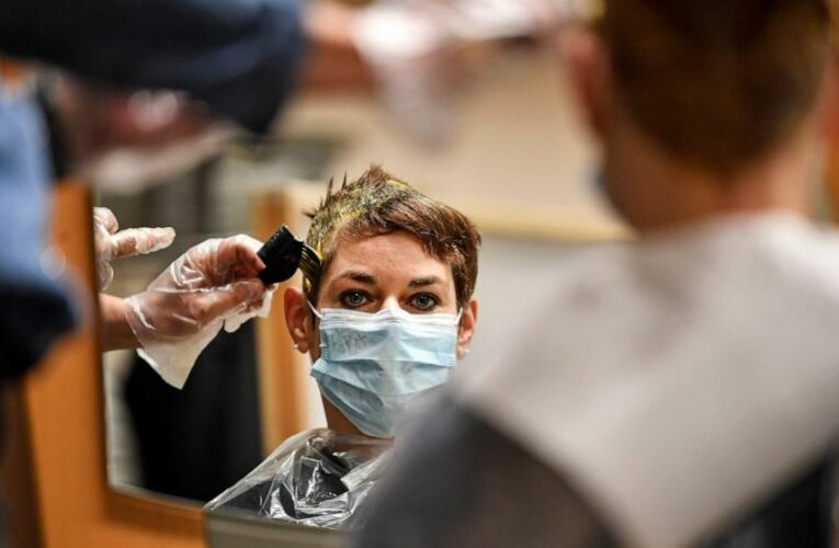 Locks down: German hairdressers reopen despite virus fears