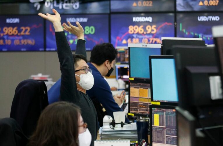 Dow, S&P 500 hit records as stimulus bill becomes law