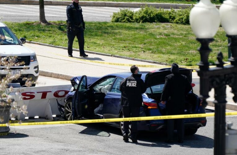 US Capitol Police say the suspect rammed barricades with his vehicle and was brandishing a knife. At least one more officer is injured