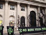 Activists launch fake oil attack on the City slickers during Extinction Rebellion prank 