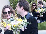 Lily James looks loved-up with American rocker boyfriend Michael Shuman in LA