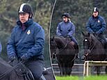 Prince Andrew looks relaxed as he goes for a horse ride around Windsor Park