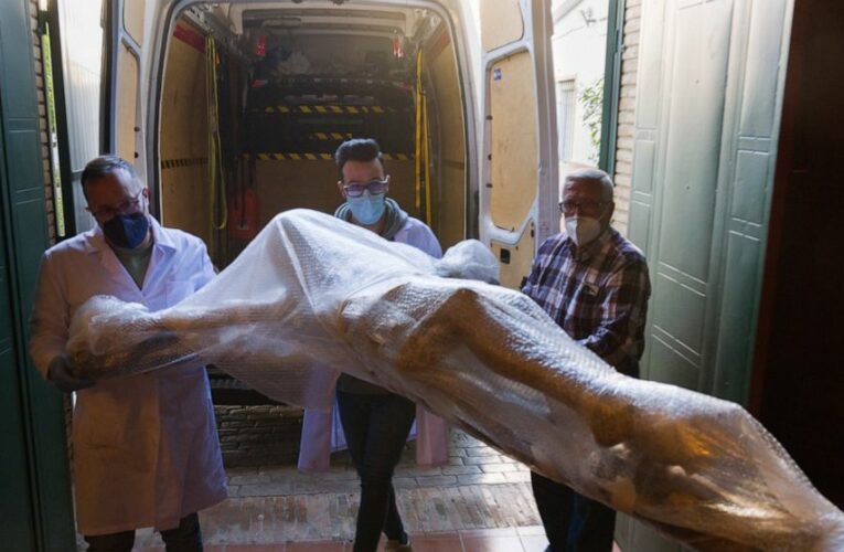 AP PHOTOS: Spain’s Seville settles for subdued Easter Week