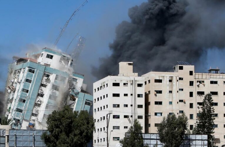 Israeli strikes hit home in Gaza refugee camp and media offices as conflict spreads