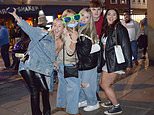 Revellers crowd into city centres to kick off the balmy Bank Holiday weekend