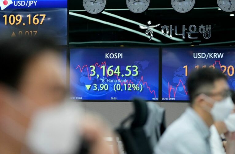 Asian shares mixed with eyes on inflation, US economy