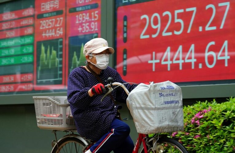 Asian stocks mostly higher on hopes for pandemic recovery
