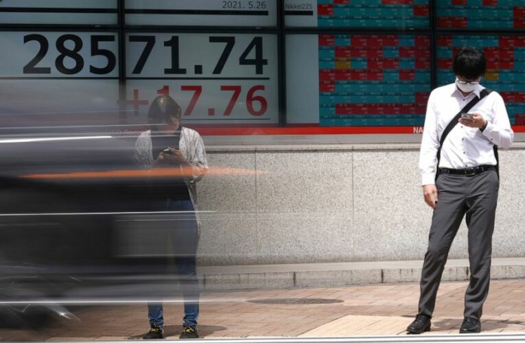 Asian shares advance as investors await US growth data