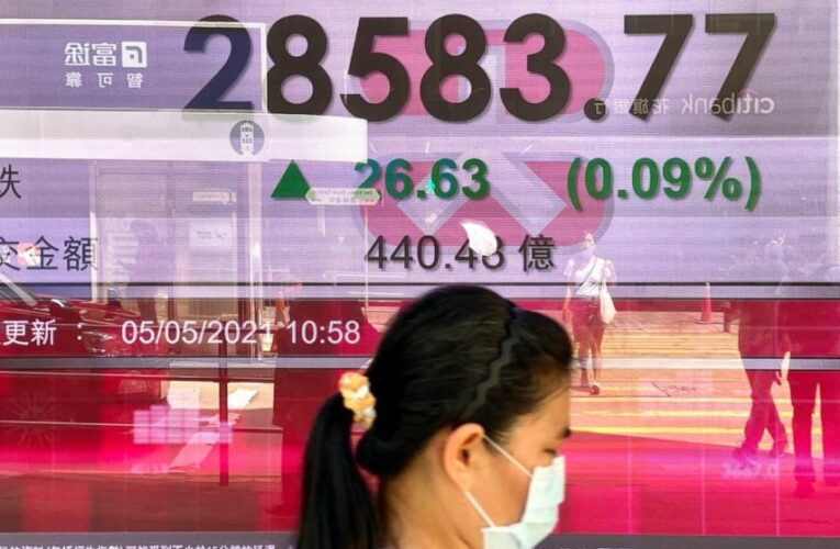 Stocks rise on solid earnings, tech rebound; Peloton drops