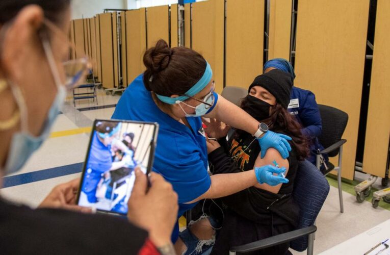 US vaccine pace needs to pick up before a dangerous variant can take hold, Fauci says
